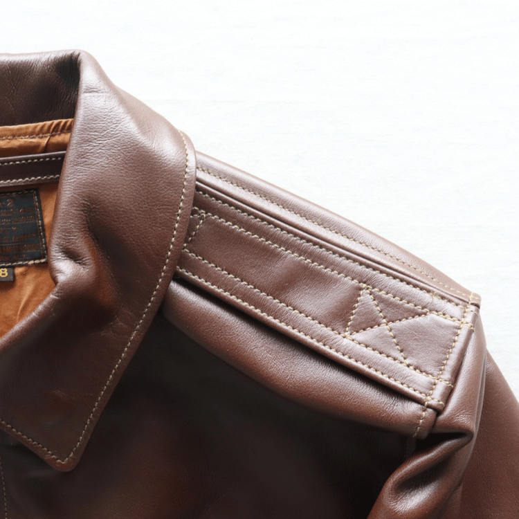 BUZZ RICKSON'S バズリクソンズ BR80659 Type A-2 “A.C. No.W535 ac 29191 BUZZ RICKSON MFG.CORP.” ブロンコ社 1942年製造モデル 陸軍航空隊 あずき色 赤褐色のラセットブラウン ステッチワーク クロスステッチ